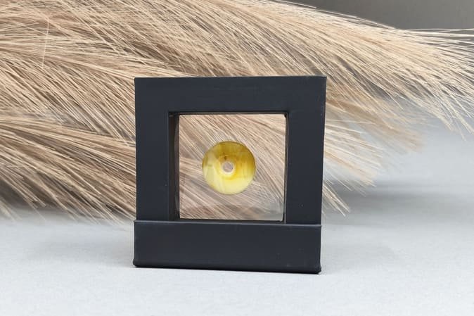 Gintarinis suvenyras rėmelyje